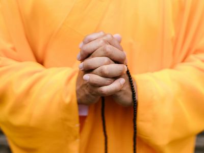 Close up of hands in a meditative position