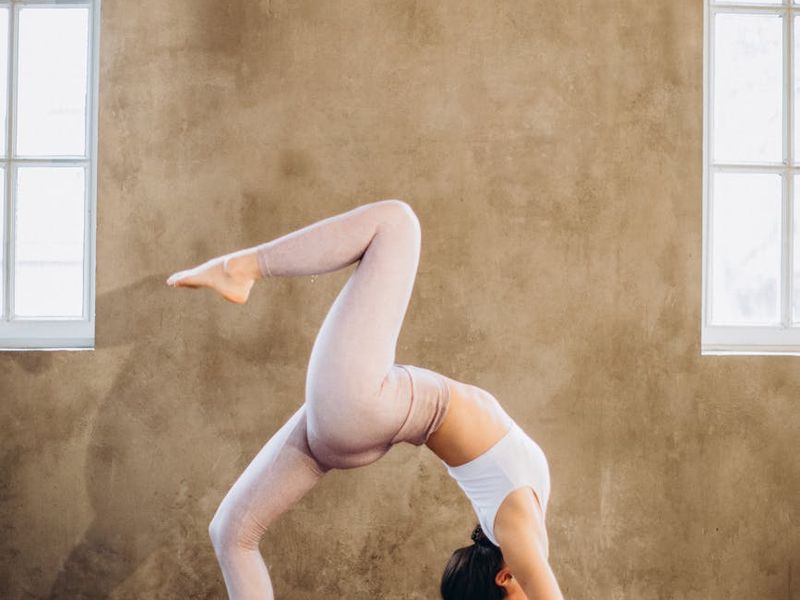 Main yoga pose showing strength and balance