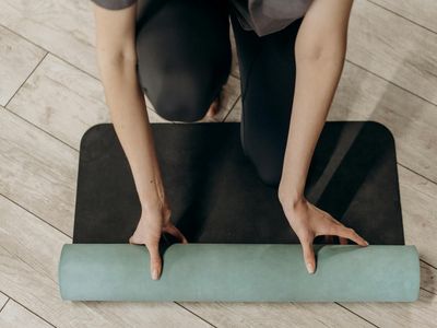Yoga equipment on a wooden floor